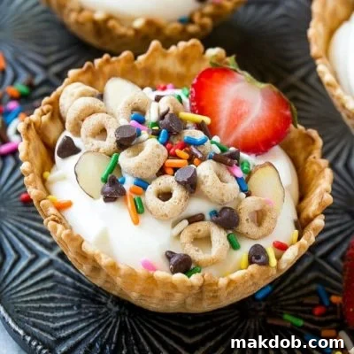 A beautifully assembled breakfast sundae with fruit, yogurt, and Cheerios, ready for a special breakfast.