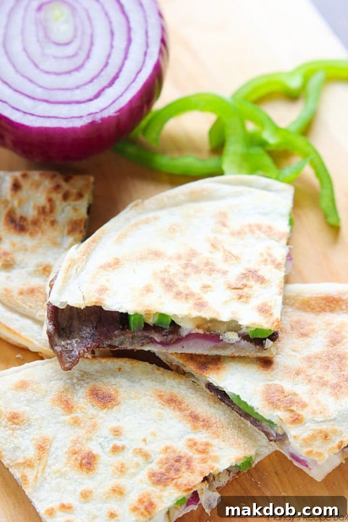 Sunday Meal Prep Simplified: Week 52 4 Philly Cheesesteak Quesadillas with melted cheese and steak