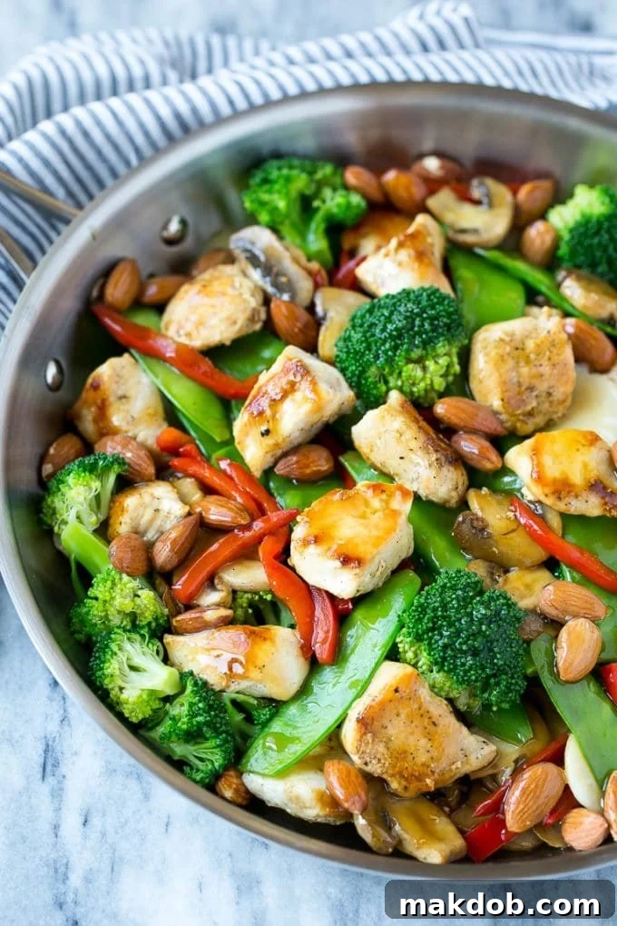 A pan full of chicken almond ding stir fry.