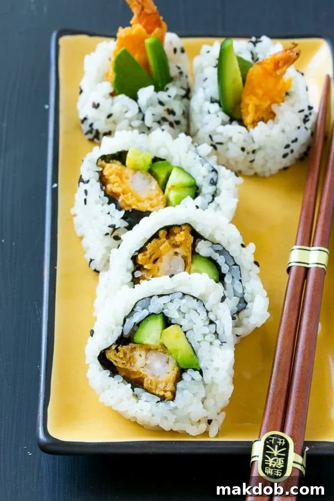 Shrimp Tempura Sushi Roll | Shrimp Tempura Sushi | Shrimp Sushi #sushi #tempura #shrimp #dinner #dinneratthezoo A serving of shrimp tempura roll sushi made with cucumber, avocado and shrimp.