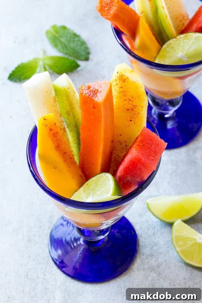 Spears of colorful fresh fruit, cucumbers and jicama in Mexican fruit cups, topped with chili lime seasoning.