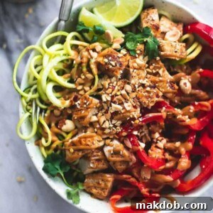 A picture of flavorful Thai peanut chicken zucchini noodles.