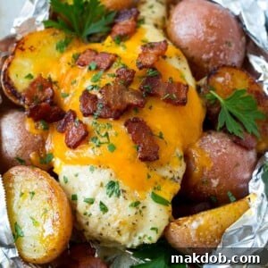 These bacon ranch chicken foil packets offer a super easy dinner option with minimal cleanup! Chicken breasts are cooked with potatoes and ranch flavored butter, then topped with melted cheese and crispy bacon for a meal that's sure to please any crowd.