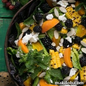 This blackberry apricot salad showcases summer's finest produce, beautifully complemented by a creamy apricot poppyseed dressing that is absolutely to die for!