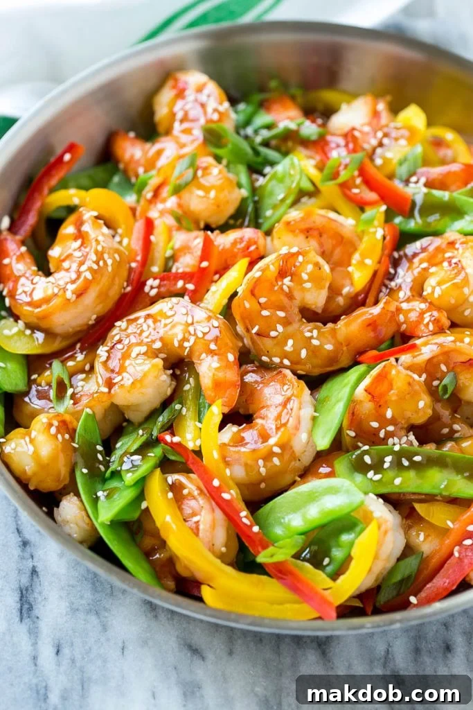 Teriyaki shrimp stir fry with shrimp, snow peas and peppers in a homemade sauce.