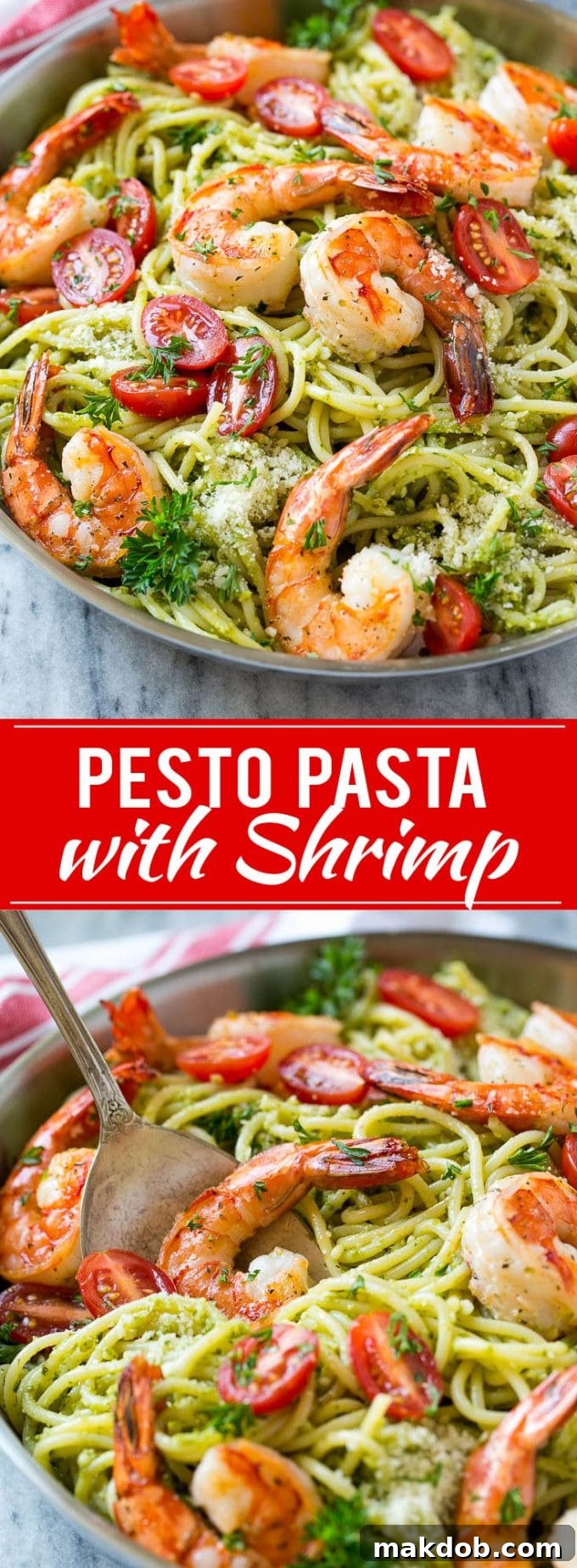 A beautifully presented pan of shrimp pesto pasta, garnished with fresh cherry tomatoes, grated Parmesan cheese, and chopped parsley, ready to be served.