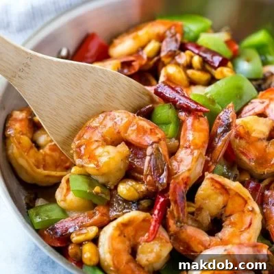 Sweet and Spicy Kung Pao Shrimp 2 This recipe for Kung Pao shrimp is veggies, peanuts and plenty of shrimp, cooked in a savory and spicy sauce. Make your own take out in just 20 minutes!
