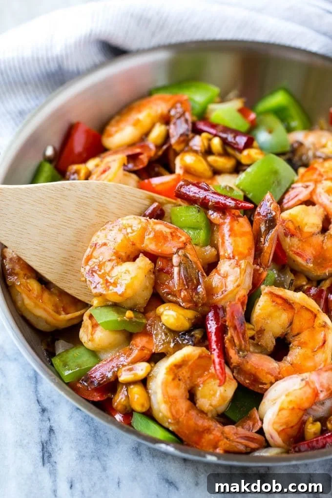 Kung Pao Shrimp | Shrimp Recipe | Shrimp Stir Fry | Easy Shrimp Recipe #shrimp #stirfry #peppers #dinner #dinneratthezoo #spicy A skillet of spicy shrimp with peanuts and vegetables.