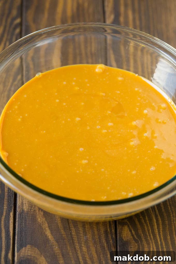 A bowl of melted caramel.
