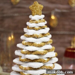 An image of a stunning tree-shaped stack of gingerbread cookies, creating a festive holiday centerpiece.