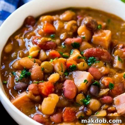 Hearty Ham Bone Slow Cooker Soup 2 This ham bone soup is loaded with beans and veggies and is the perfect way to use up leftover ham!