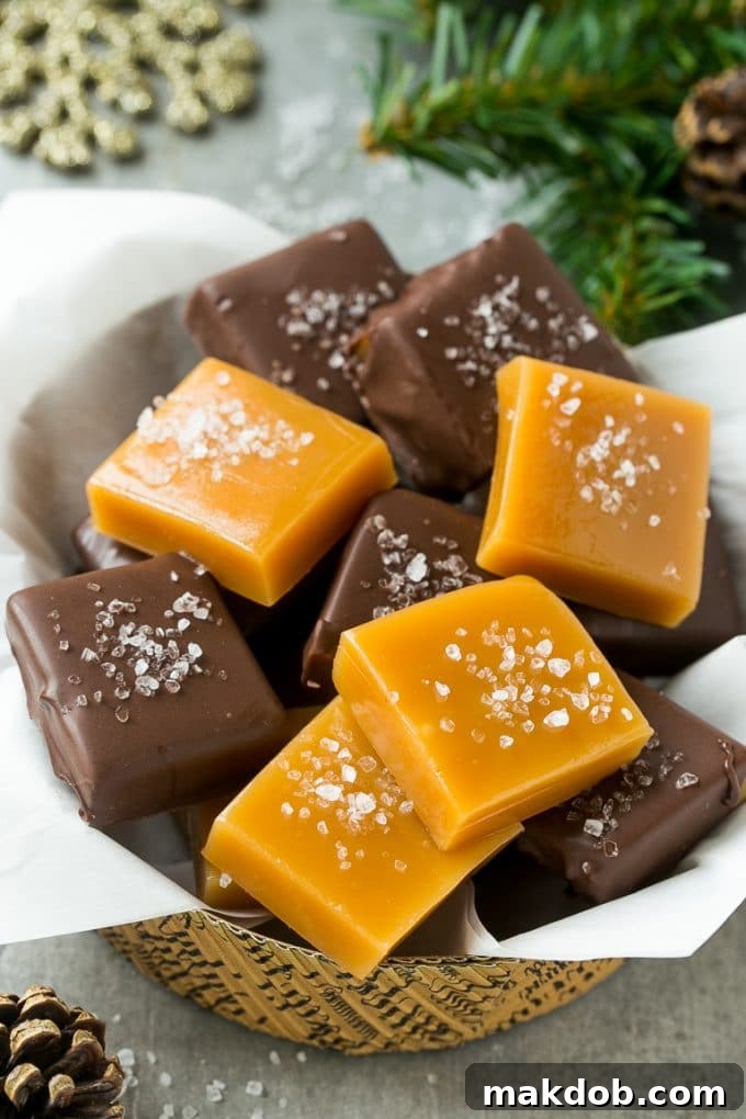 Exquisite chocolate-covered microwave caramels, beautifully finished with a glistening sprinkle of sea salt, arranged as a luxurious homemade dessert.