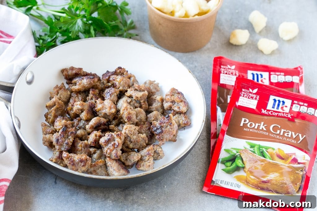 Brat & Beer Cheese Dip Recipe | Beer Cheese Dip | Cheese Dip | Easy Appetizer #beer #cheese #dip #sausage #appetizer #dinneratthezoo Cooked bratwurst, cheese curds and packets of gravy mix are the ingredients for beer cheese dip.
