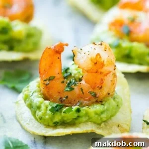 This recipe for Mexican shrimp bites is seared shrimp and guacamole layered onto individual potato chips. A super easy appetizer that's elegant enough for entertaining! #ad