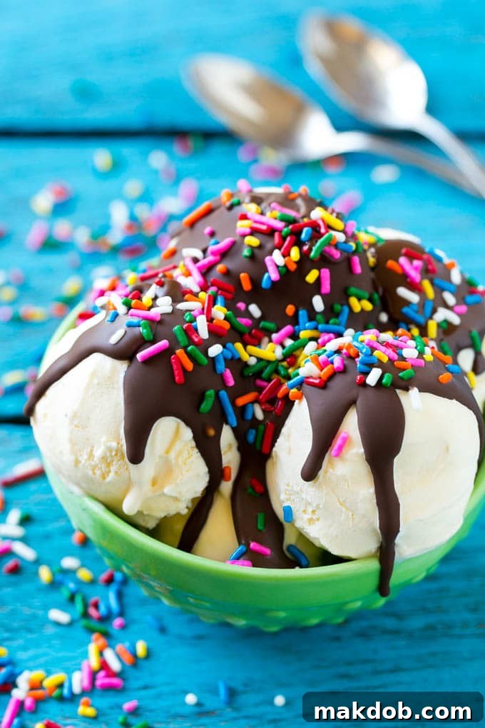 Homemade Magic Shell Recipe | Chocolate Ice Cream Topping | Chocolate Sauce | Hard Chocolate Coating #chocolate #icecream #dessert #dinneratthezoo Magic shell over scoops of ice cream, topped with rainbow sprinkles.