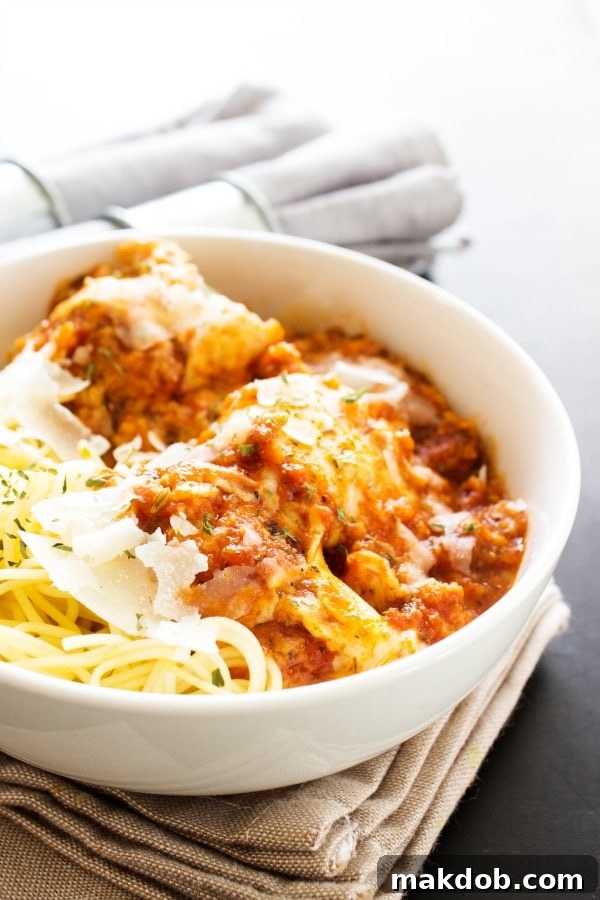 88 Sundays of Stress-Free Eating 4 Tender Slow Cooker Chicken Parmesan recipe, perfect for a comforting Monday dinner.
