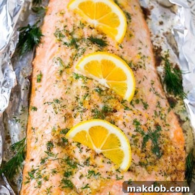 This recipe for salmon in foil is the easiest and most delicious way to eat fish! Salmon is flavored with lemon garlic butter, baked in foil, then topped with fresh dill. The perfect meal for any occasion!