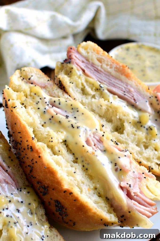 Gourmet Honey Mustard Ham and Cheese Sandwich, perfectly grilled with melted cheese.