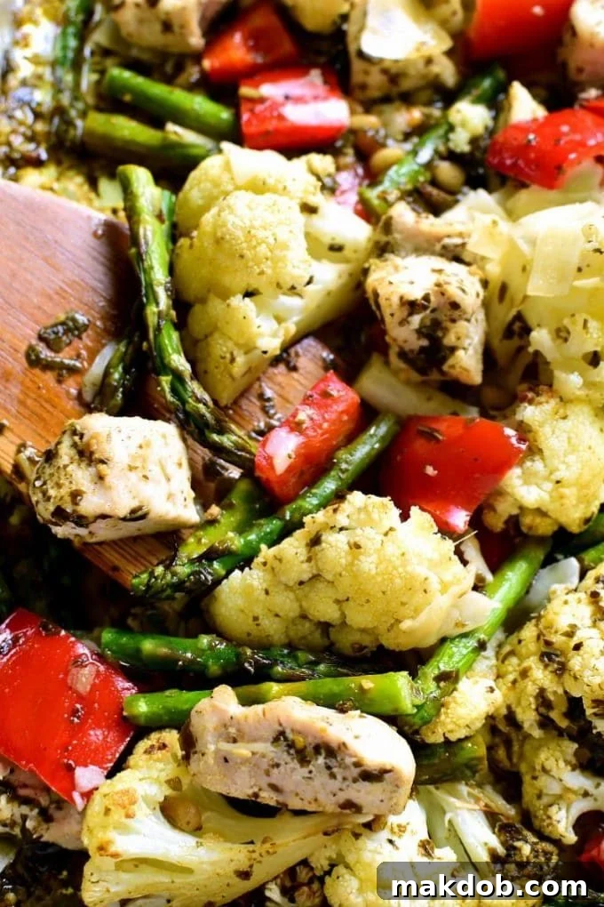 Sheet Pan Pesto Chicken with colorful roasted vegetables
