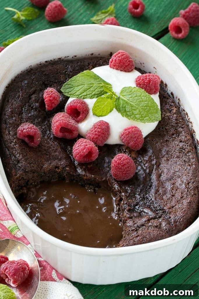 The chocolate pudding cake batter with the brown sugar and cocoa mixture sprinkled on top, before adding boiling water.