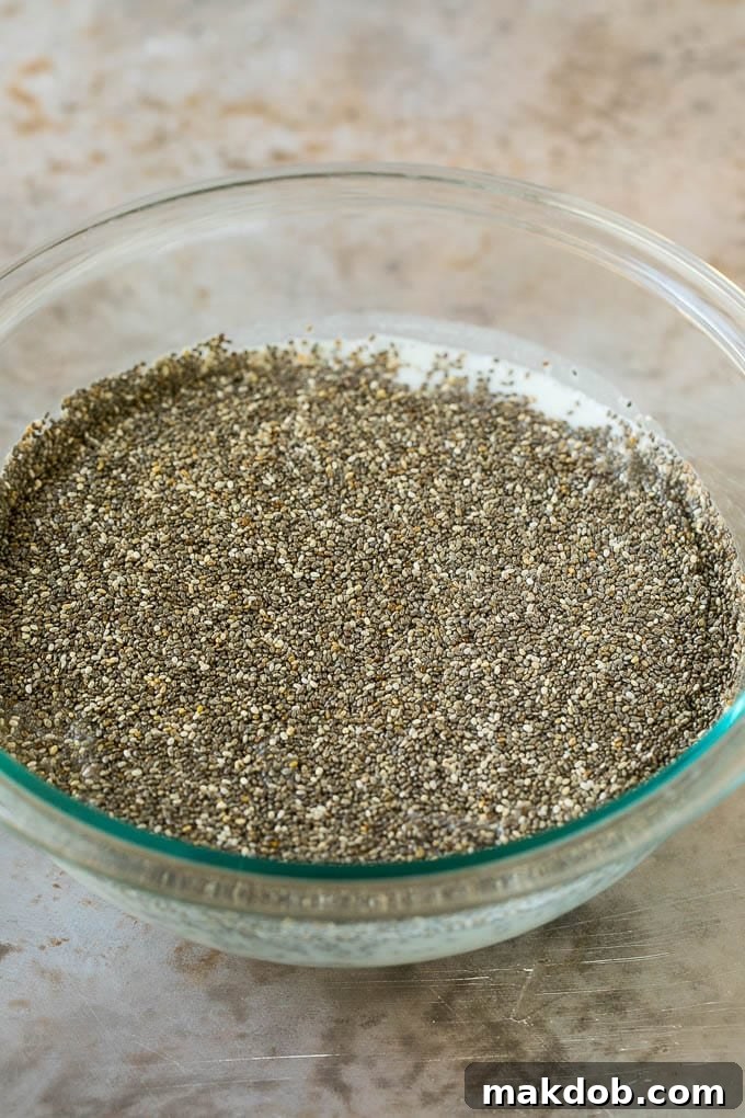 Chia seeds and coconut milk in a bowl.