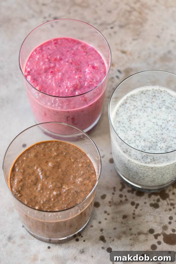 Cups of coconut chia pudding, raspberry chia pudding and chocolate chia pudding.