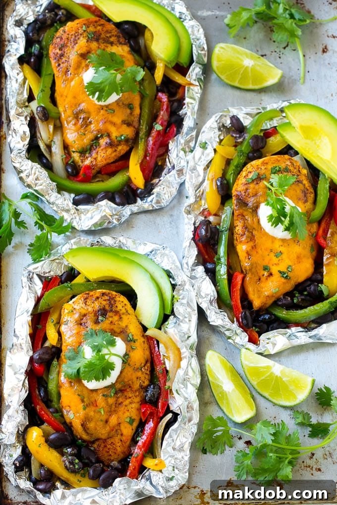 A tray of fajita chicken foil packets.