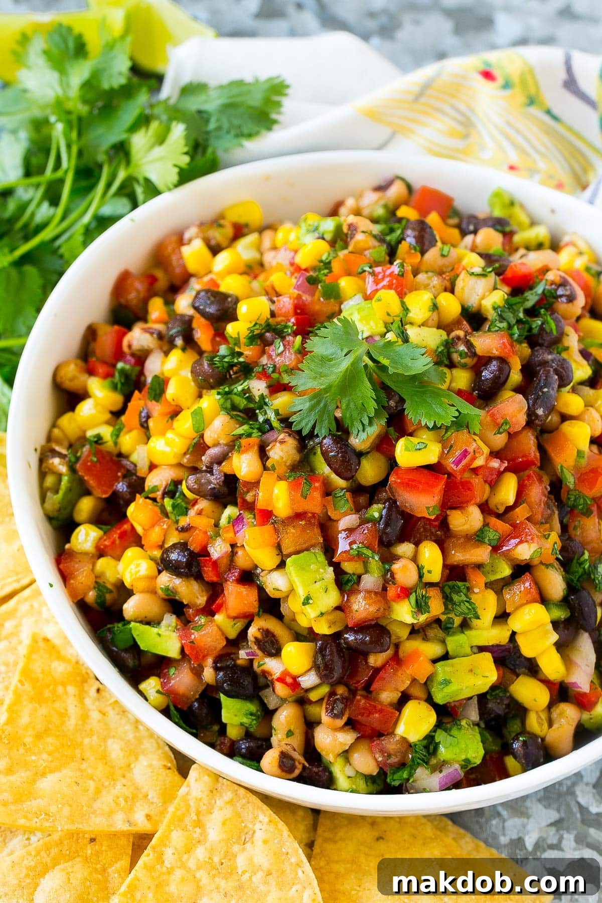 Fiesta Bean Salad 7 A bowl of cowboy caviar served with chips.