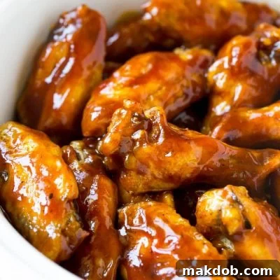 Fall-Off-The-Bone Slow Cooker Wings 6 A slow cooker full of barbecue chicken wings.