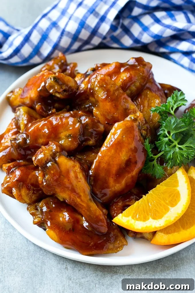 Fall-Off-The-Bone Slow Cooker Wings 4 Slow cooker chicken wings on a serving platter.