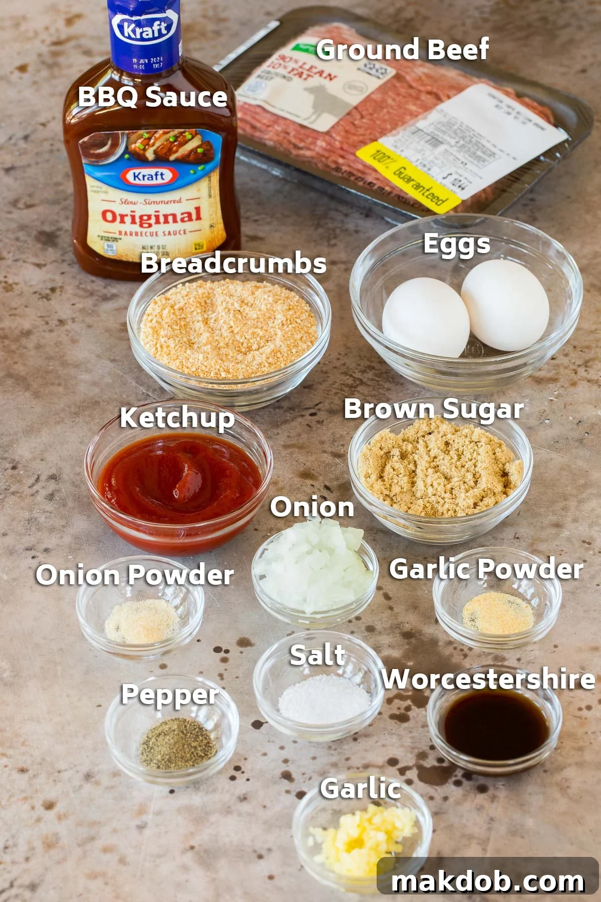 Slow-Cooker BBQ Meatball Magic 3 Ingredients including onion, garlic, BBQ sauce, ground beef and seasonings.